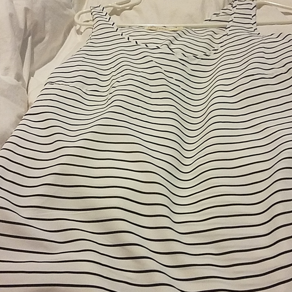 Black and white sleeveless blouse